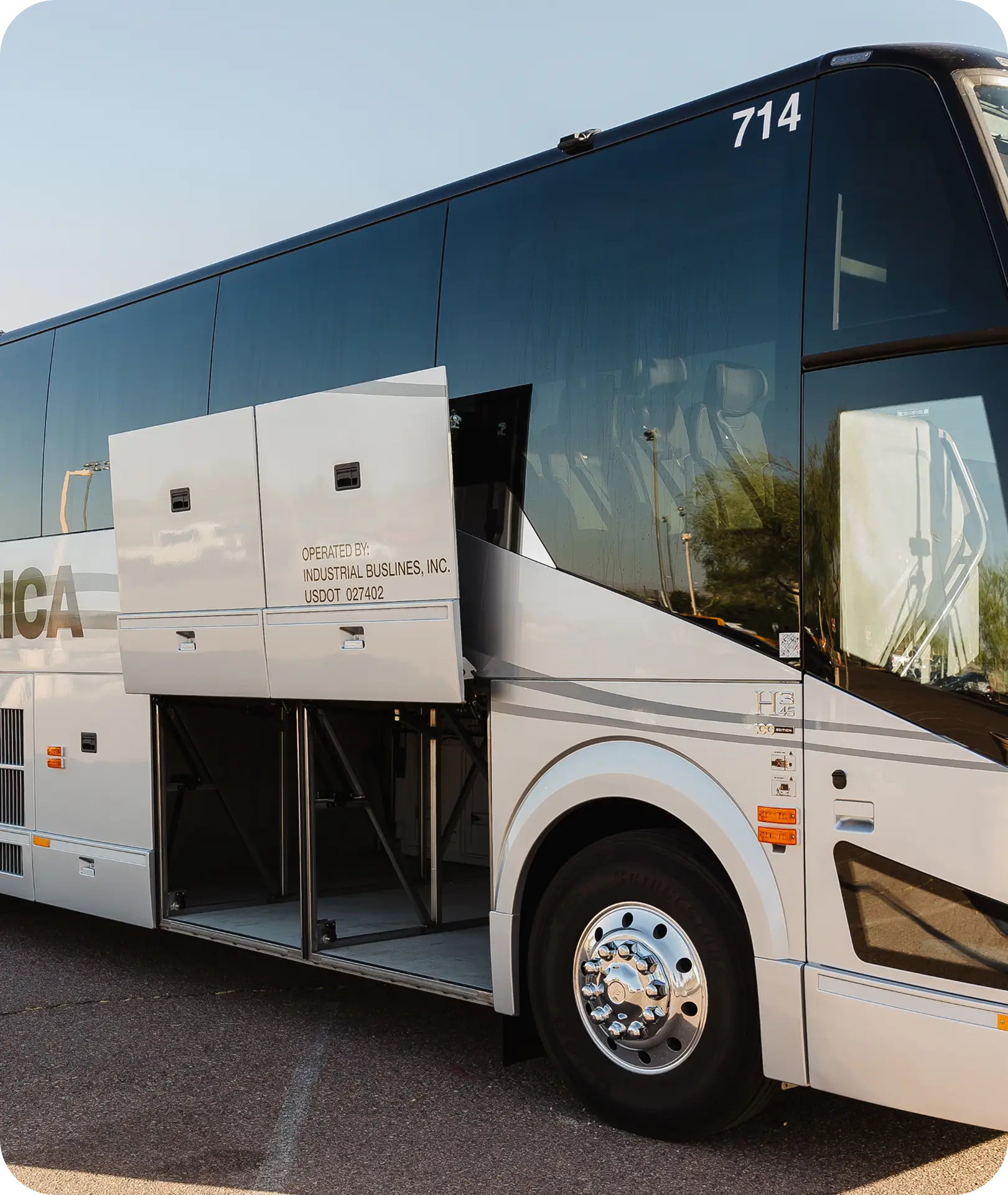 Open undercarriage storage compartment on an All Aboard America Prevost motorcoach for sports team equipment